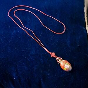 Unbranded cloisonne perfume bottle on crimson cord 16"